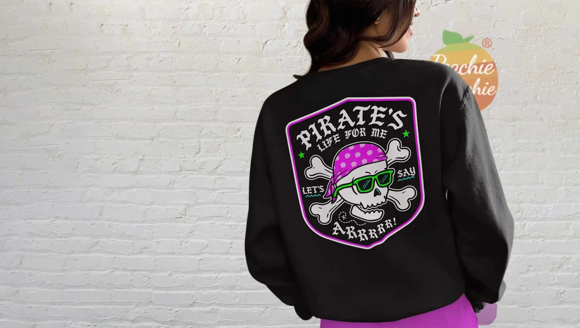 Black long-sleeved sweatshirt with a vibrant pirate skull graphic.